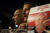 People attend a protest against the government and to show support for the hostages who were kidnapped during the deadly October 7 attack, in Tel Aviv