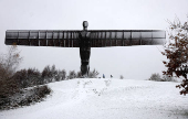 Snowfall at Antony Gormley's Angel of the North, in Gateshead