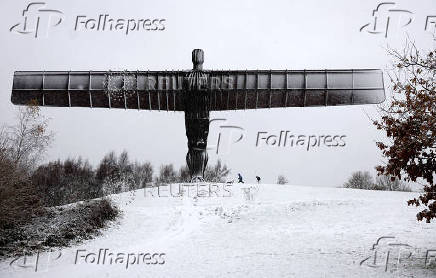 Snowfall at Antony Gormley's Angel of the North, in Gateshead