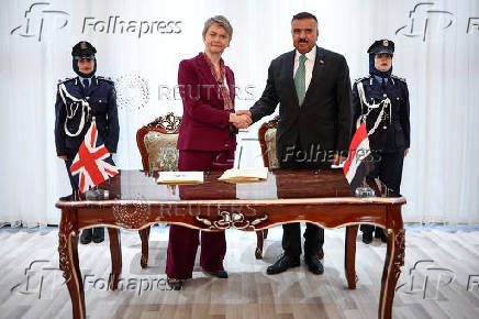 Britain's Home Secretary Yvette Cooper meets Iraq's Minister of Interior Abdul Amir Al-Shammari, in Baghdad