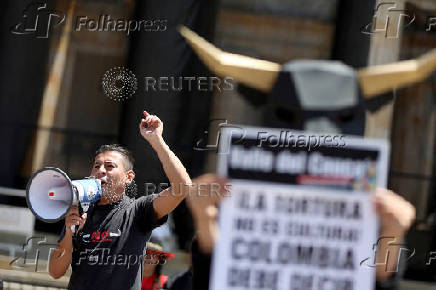 Activists protest against bullfighting, in Bogota