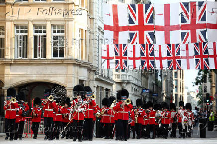 The Band of the Coldstream Guards march ahead of a banquet with Japan's Emperor Naruhito and Japan's Empress Masako, at The Guildhall in London