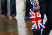 A person carries a British Union Flag design plastic bag in London