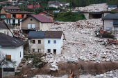 A drone view shows a flooded residential area in Donja Jablanica