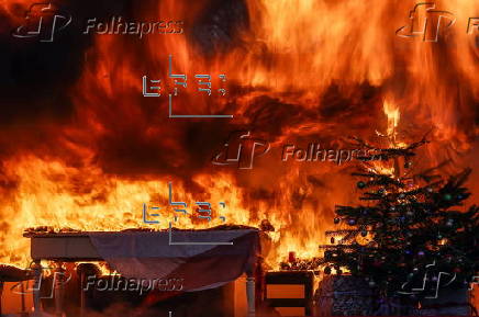 Fire department in Berlin demonstrates fire hazard from Christmas tree candles