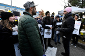 Jagmeet Singh joins striking Canada Post workers on the picket line in Surrey