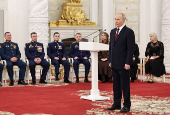 Russian President Vladimir Putin attends an awarding ceremony in Moscow