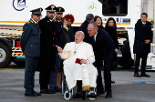 Pope Francis boards the papal plane for his apostolic visit to Corsica, at Fiumicino airport