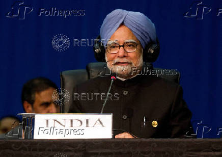 FILE PHOTO: Indian Prime Minister Manmohan Singh makes his closing remarks during the fifth BRICS Summit in Durban