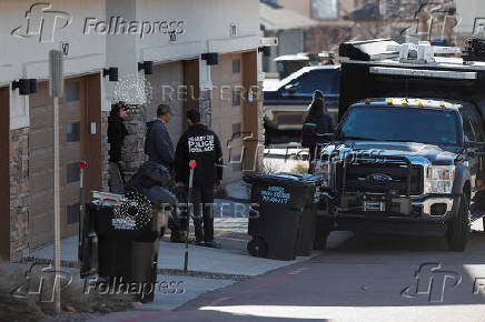 Investigators search a townhouse, in relation to the explosion in Las Vegas of a Tesla Cybertruck