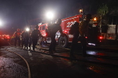 Firefighters battle the Hollywood Hills Fire in Los Angeles, California