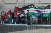 People hold a Pro-Palestinian demonstration in Nottingham