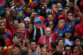 Government supporters participate in a march in support of Venezuelan President Nicolas Maduro?s victory in the July 28 elections, in Caracas