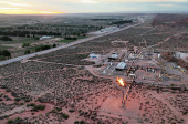 FILE PHOTO: A drone view shows a shale gas flare in the Vaca Muerta formation outside the Patagonian oil and gas town Anelo