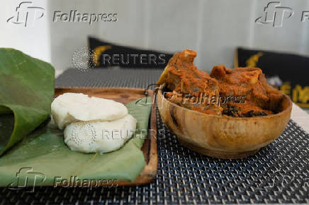 A local dish of pounded yam and efo riro is served at a restaurant in Lagos