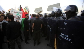 Supporters of Hezbollah Brigades protest against the killing of Nasrallah, in central Baghdad