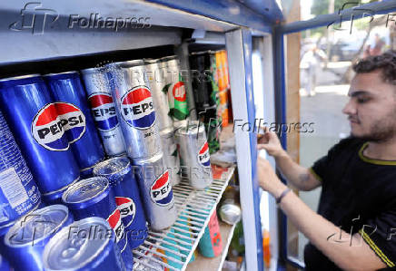 FILE PHOTO: In West Bank, Pepsi and Coke bottlers face can and sugar shortage