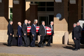 Former U.S. President Carter's casket travels to Atlanta, Georgia