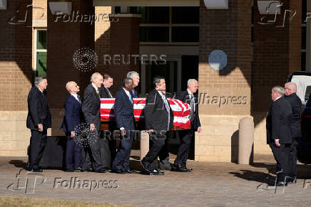 Former U.S. President Carter's casket travels to Atlanta, Georgia