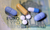 Illustration shows Euro banknote and medicines