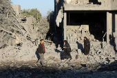 Site of an Israeli strike on a house, amid the Israel-Hamas conflict, in Al Maghazi refugee camp in the central Gaza Strip