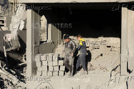 Site of an Israeli strike on a house, amid the Israel-Hamas conflict, in Al Maghazi refugee camp in the central Gaza Strip