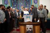 Presidential candidate Saeed Jalili votes at a polling station in a snap presidential election, in Tehran