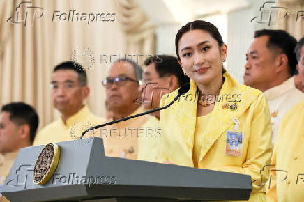 Thailand's Prime Minister Paetongtarn Shinawatra and her cabinet members attend a press conference in Bangkok