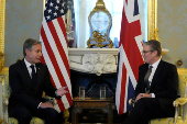 Britain's Prime Minister Keir Starmer listens to U.S. Secretary of State Antony Blinken as they meet at Lancaster House in London