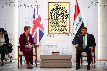 Britain's Home Secretary Yvette Cooper meets Iraq's Minister of Interior Abdul Amir Al-Shammari, in Baghdad