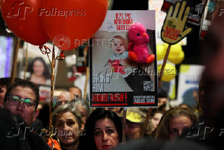 People gather to mark the second birthday of the youngest hostage in Gaza, Kfir Bibas, in Tel Aviv