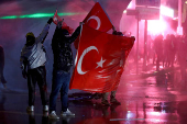 People take part in a protest on the day Istanbul Mayor Imamoglu was jailed as part of a corruption investigation, in Ankara