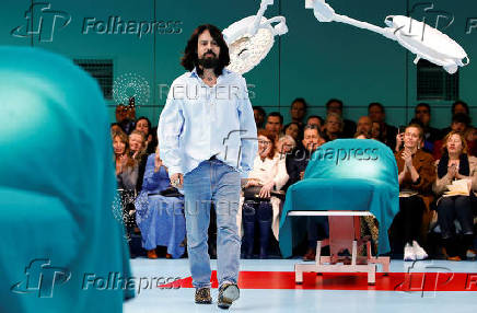 FILE PHOTO: Fashion designer Michele acknowledges at the end of the Gucci Autumn/Winter 2018 women collection show during Milan Fashion Week in Milan