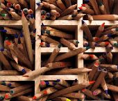FILE PHOTO: Coloured pencils are pictured in a wooden box at a nursery school in Eichenau