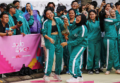 Players attend an event with the Red Light, Green Light game at Gelora Bung Karno Stadium ahead of the release of the Netflix series Squid Game: Season 2 in Jakarta