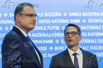 Swiss National Bank (SNB) governing board chairman Thomas Jordan and vice chairman Martin Schlegel attend the annual general meeting in Bern