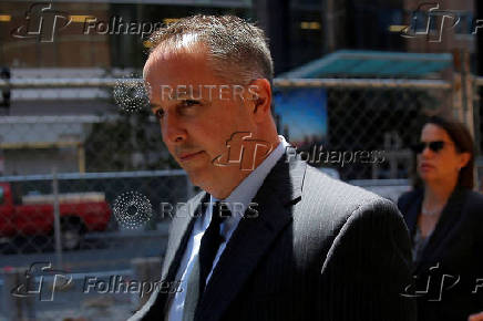 FILE PHOTO: Pharmacist Barry Cadden, co-founder of the now-defunct New England Compounding Center, arrives to be sentenced in Boston