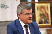 Cyprus' Minister of Energy, Commerce and Industry George Papanastasiou speaks during an interview with Reuters at his office in the ministry in Nicosia