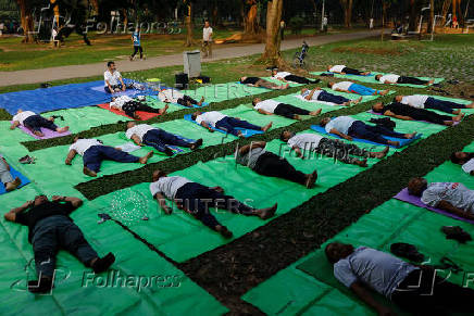 People practice yoga at Ramna Park in the morning, in Dhaka