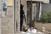 Palestinian security forces operate at the camp in Jenin