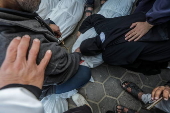 Palestinians mourn their dead at Deir Al Balah hospital after Israeli airstrike in central Gaza