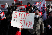 Pro-Yoon protesters participate in a rally outside a court, in Seoul