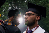Morehouse College graduates arrive ahead of a commencement ceremony in Atlanta
