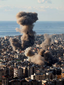 Smoke billows in Beirut's southern suburbs, after an Israeli strike