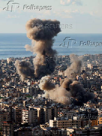 Smoke billows in Beirut's southern suburbs, after an Israeli strike