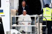 Pope Francis boards the papal plane for his apostolic visit to Corsica, at Fiumicino airport