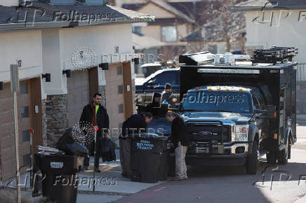 Investigators search a townhouse, in relation to the explosion in Las Vegas of a Tesla Cybertruck