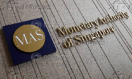 FILE PHOTO: The logo of the Monetary Authority of Singapore is pictured at its building in Singapore