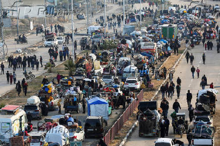 Displaced Palestinians wait to be allowed to return to their homes in northern Gaza, in the central Gaza Strip