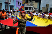 Government supporters participate in a march in support of Venezuelan President Nicolas Maduro's victory in the July 28 elections, in Caracas